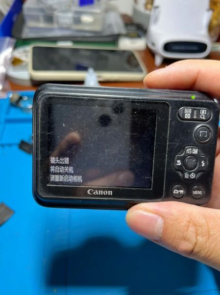 佳能相机镜头卡住怎么办_镜头无法缩回维修技巧-第2张图片-星辰妙记